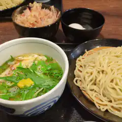 Japanese noodle meal with dipping sauce and toppings