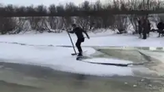 Man falls through ice while ice fishing