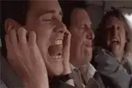 Three men screaming in a car