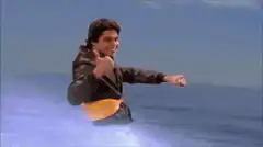 Man water skiing with a rope