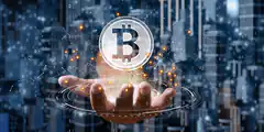 hand holding holographic bitcoin