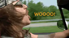 woman screaming wooooo in car