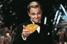 Leonardo DiCaprio offering a cookie