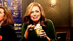Woman eating ice cream with a disgusted face