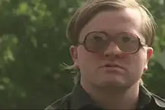 Tom Felton as Draco Malfoy wiping his brow