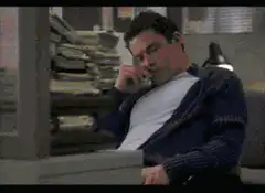 Clark Kent rubbing his nose