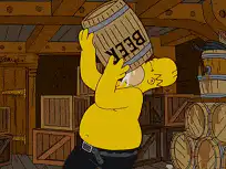 Homer Simpson drinks from beer barrel
