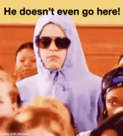 Woman in purple hoodie and sunglasses