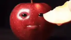 Fruit with human faces eating