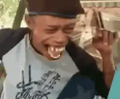 Man with large teeth laughing hysterically