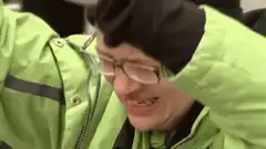 Guy in green jacket screaming