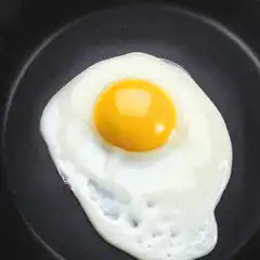 Fried egg with blinking yolk