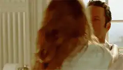 Woman slaps man with her hair