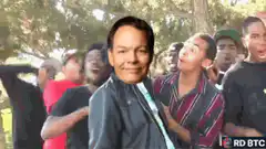 Carl Weathers dancing with confused crowd