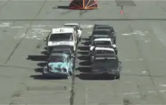 Crash test cars hit by wedge