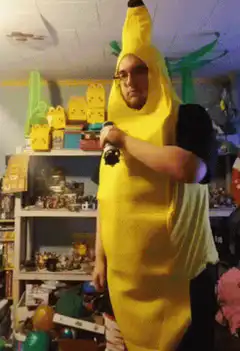 Man in banana costume with lightsaber