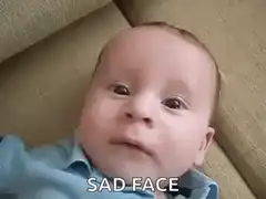 Baby crying sad face