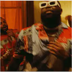 Rick Ross dancing in a party