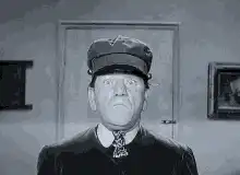 Man's hat flies off and back on
