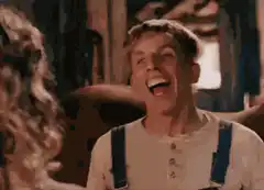 Billy Zane laughing hysterically