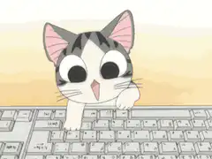 Cute cat typing on keyboard