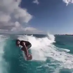 person surfing on a wave