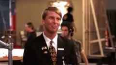 David Spade drinks water and spits it out