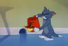 Tom pours coffee into a bowl
