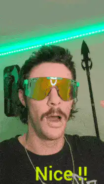 Man lifts goggles to reveal face