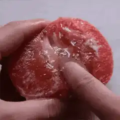 Squishing a juicy grapefruit