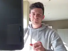 man pointing at computer monitor