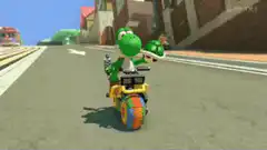 Yoshi gets hit by a train in Mario Kart