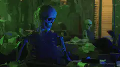 Skeleton typing at a desk