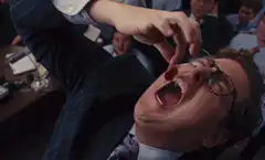 Man eating a gummy bear