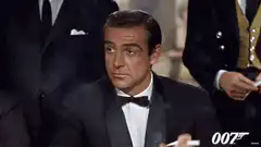 Sean Connery as James Bond smoking