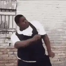 Man in vest dancing energetically