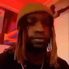 Man in beanie gets hit with a shoe
