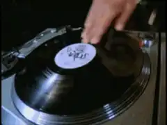 DJ scratching vinyl record