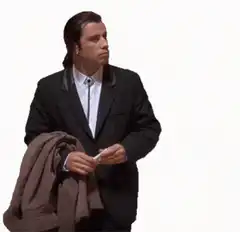 John Travolta looking confused and shrugging