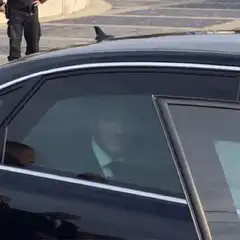 Prince Harry waving from car