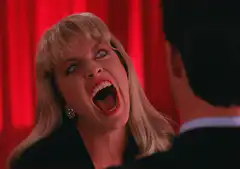Carrie screaming at a man
