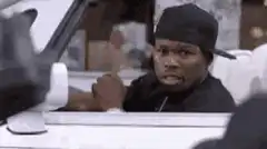 50 Cent looking at a dog
