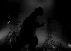 Godzilla destroying power lines