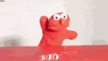 Elmo dancing and shouting