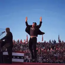 Trump jumps on stage