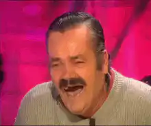 Joel McHale laughing