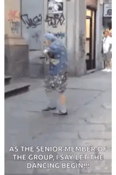 Old lady dancing on the street