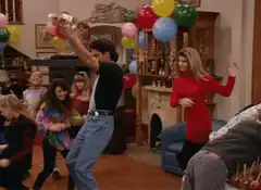 Ross smashes piñata at party
