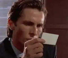 Batman sniffing a card