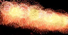 colorful fireworks exploding in night sky